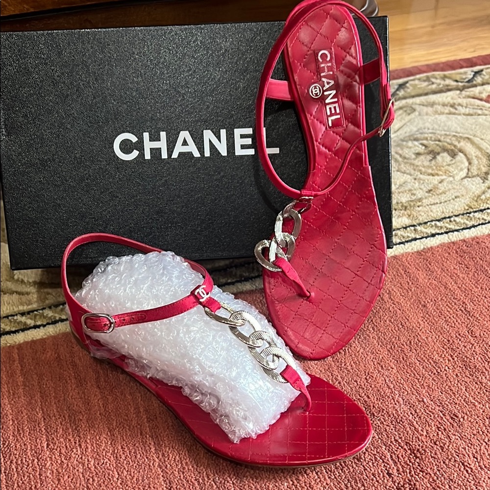Chanel Red Sandals with silver metal logo.
